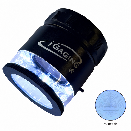 A black iGaging magnifying lens with a bright white illuminated view, shown on a white background with a circular inset displaying the #2 reticle pattern.